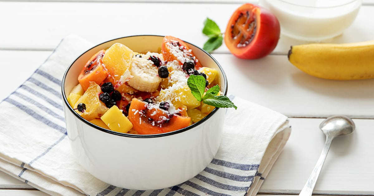 Fruit salad with coconut flakes